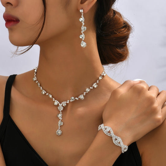 Sparkling Crystal Jewelry Set – Necklace, Studs & Bracelet Trio